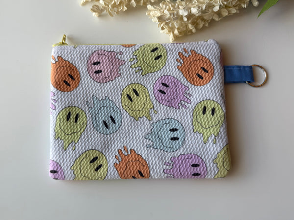 Melty Happy Face Medium Zippered Pouch