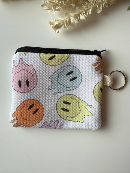 Melty Happy Face Mini Zippered Pouch