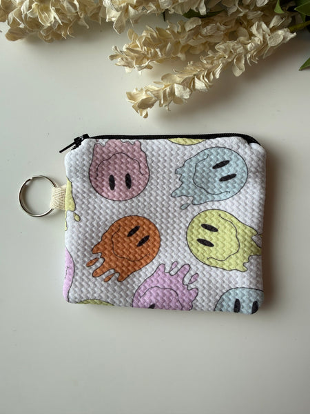 Melty Happy Face Mini Zippered Pouch