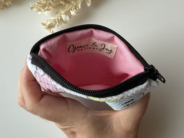 Melty Happy Face Mini Zippered Pouch
