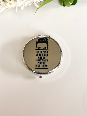 Trying to Not Connect silver Compact mirror