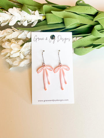 Shiny Pink Bow Earrings