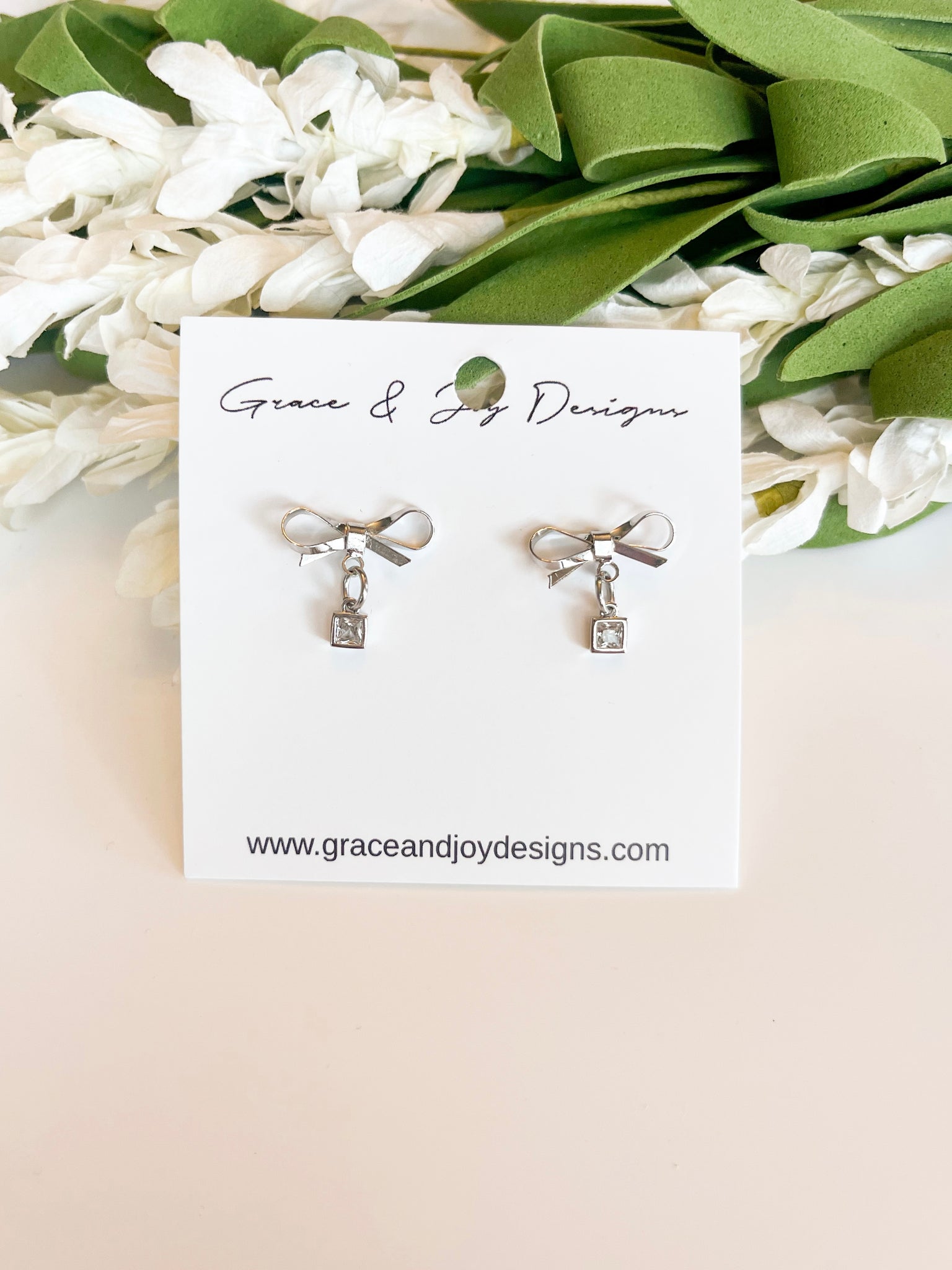 Silver Bow Stud with faux diamond drop Earrings