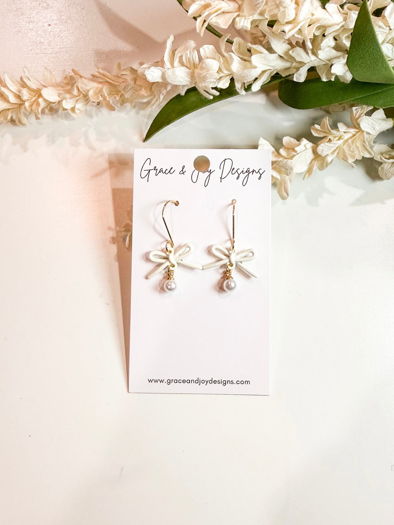 White Bows with Faux Pearls Earrings