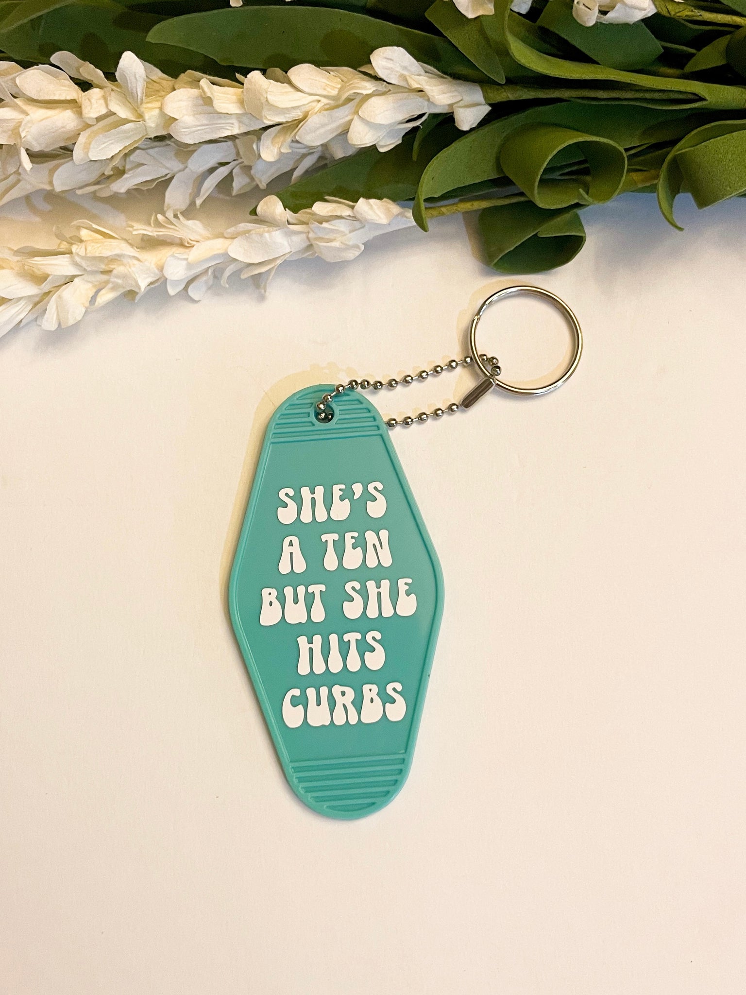 She’s a ten but Motel style Keychain