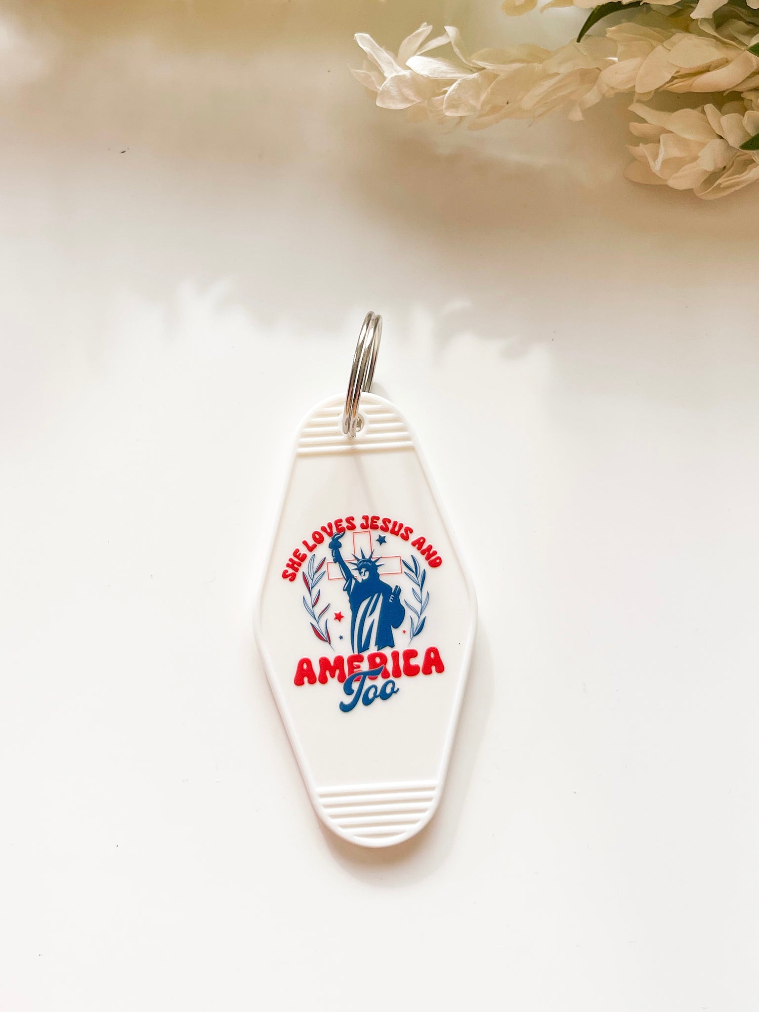 Loves Jesus America White Acrylic Motel style Keychain