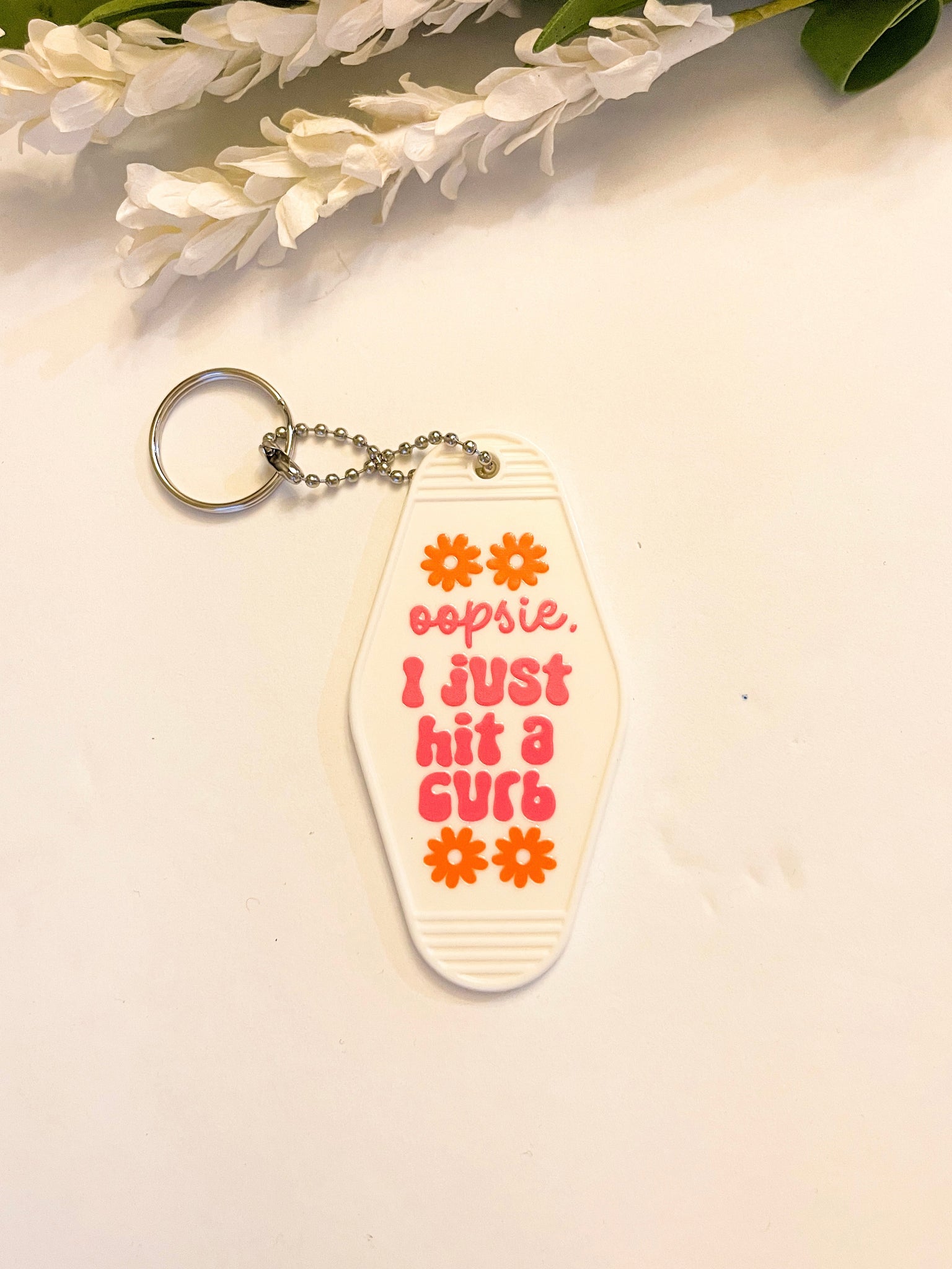 Oopsie Curb White Acrylic Motel style Keychain