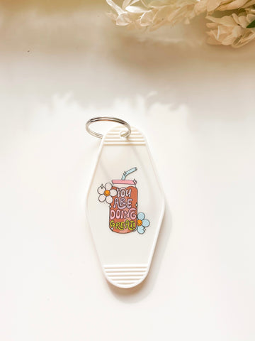 Doing great White Acrylic Motel style Keychain